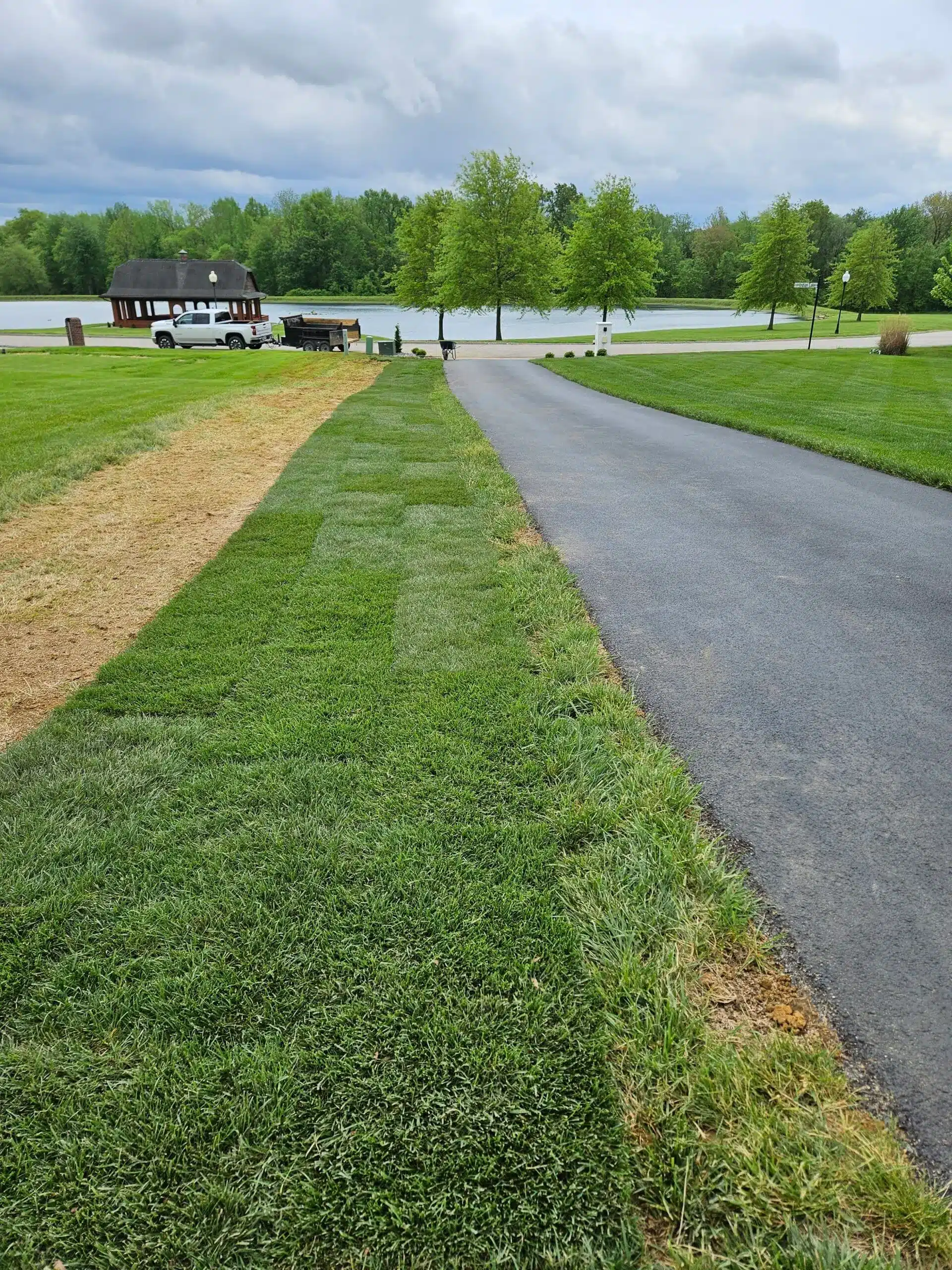 Roadway with grass trimmed and mowed